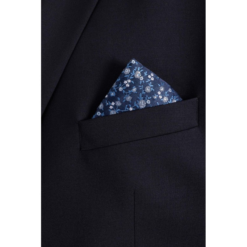 pochette de veste bleu marine motifs fleurs blanches et bleues