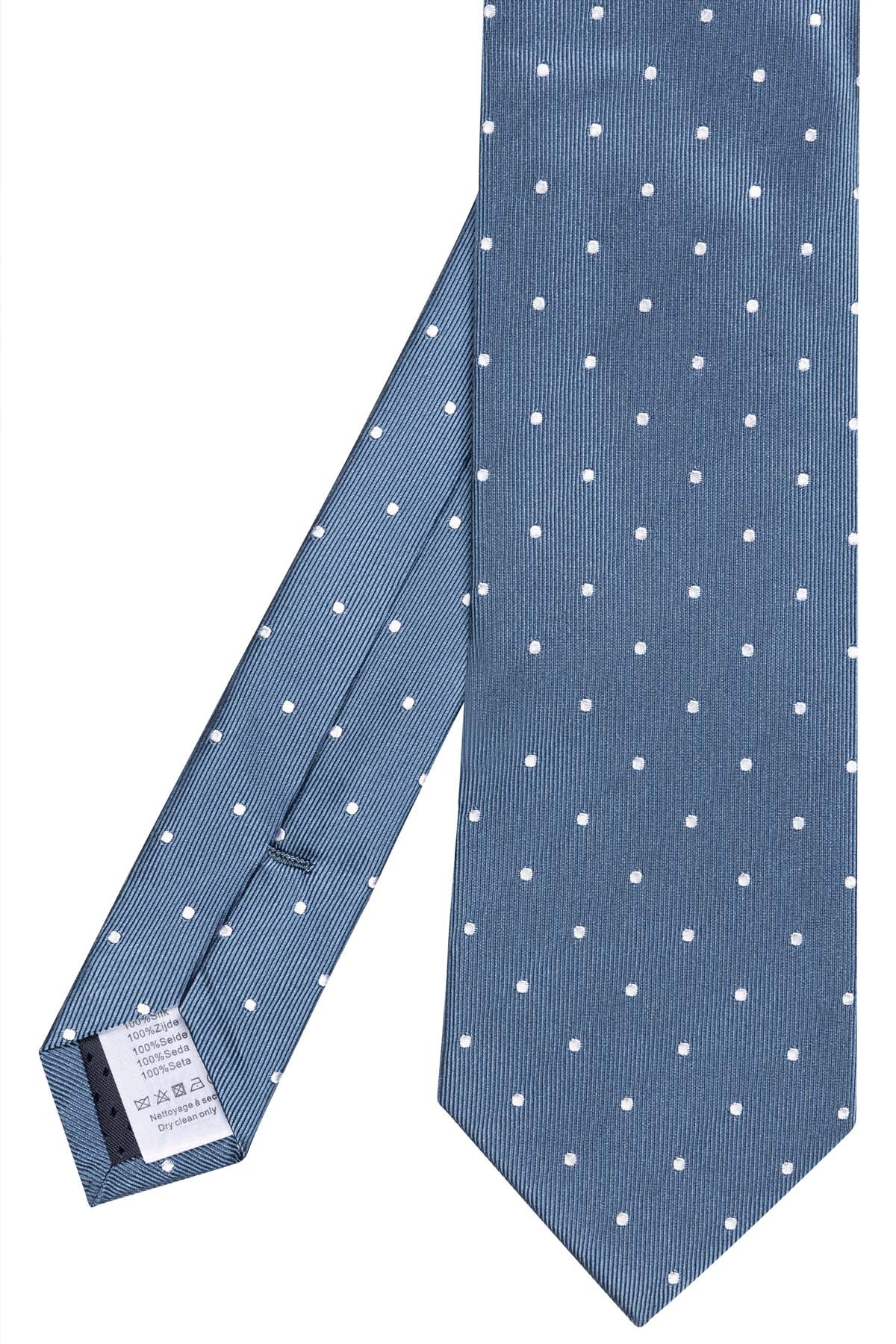 Cravate bleue à pois blancs